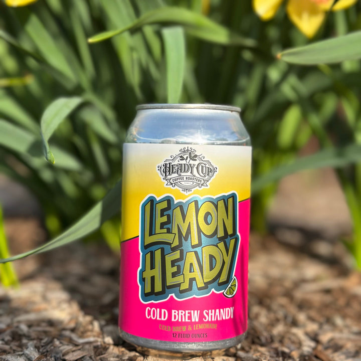 Picture of Lemon Heady Cold Brew Shandy Lemonade and Coffee can and tulips