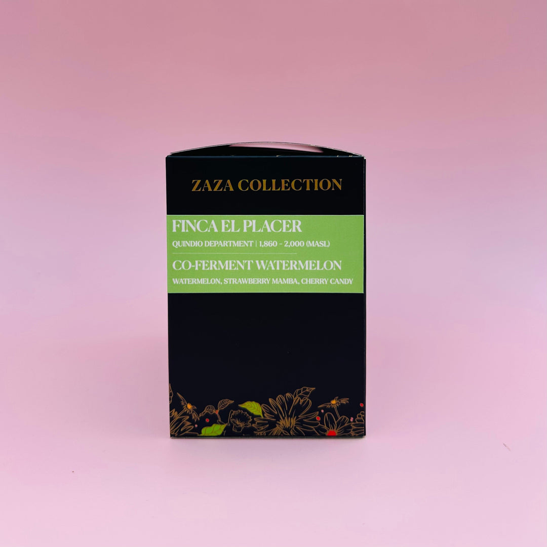 A black rectangular Heady Cup Coffee Roasters coffee box from their Zaza Collection, labeled 'Finca El Placer Co-Ferment Watermelon', set against a solid pink background.
