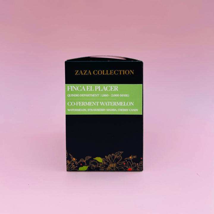A black rectangular Heady Cup Coffee Roasters coffee box from their Zaza Collection, labeled 'Finca El Placer Co-Ferment Watermelon', set against a solid pink background.
