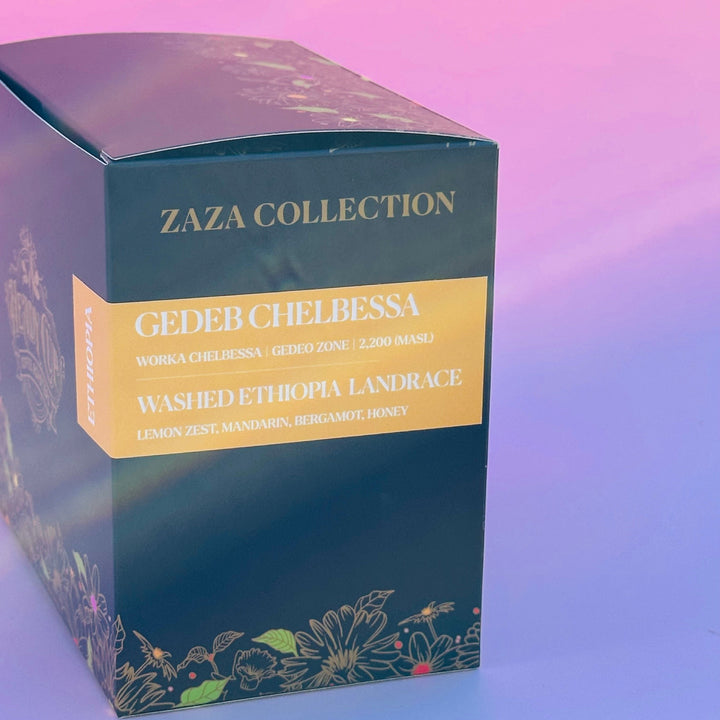 A black Heady Cup Coffee Roasters Zaza Collection box of Ethiopia Coffee. Label is yellow and box is against a pink background. 