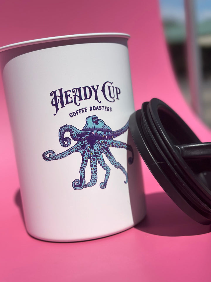 Heady Cup Coffee Roasters Airscape Container picture in a parking lot on a sunny day