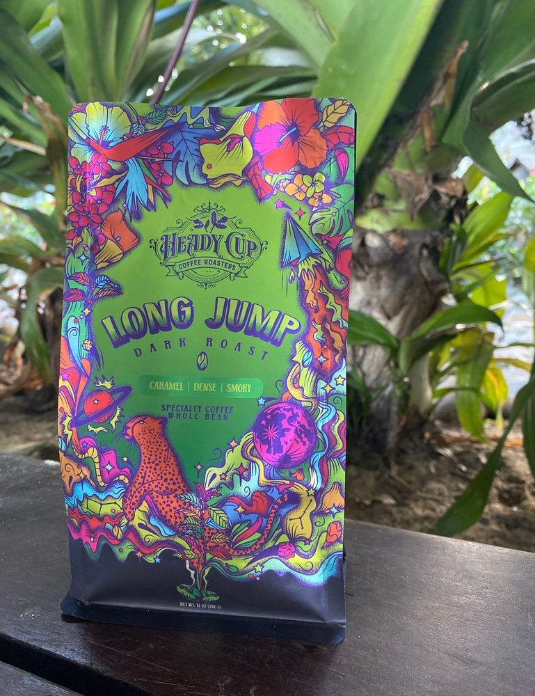 
                  
                    LONG JUMP IS OUR HEAVY-BODIED DARK ROAST BLEND CRAFTED TO EVOKE FEELINGS OF SMELLING YOUR FIRST CUP OF COFFEE. BITTERNESS FROM DARK CHOCOLATE IS TEMPERED BY THE FLAVORS OF OF STONE FRUIT AND HONEY. LONG JUMP IS AN OLD-SCHOOL EARTHY AND SYRUPY BLEND WITH AN ADDICTIVE SMOOTH AFTERTASTE. 
                  
                