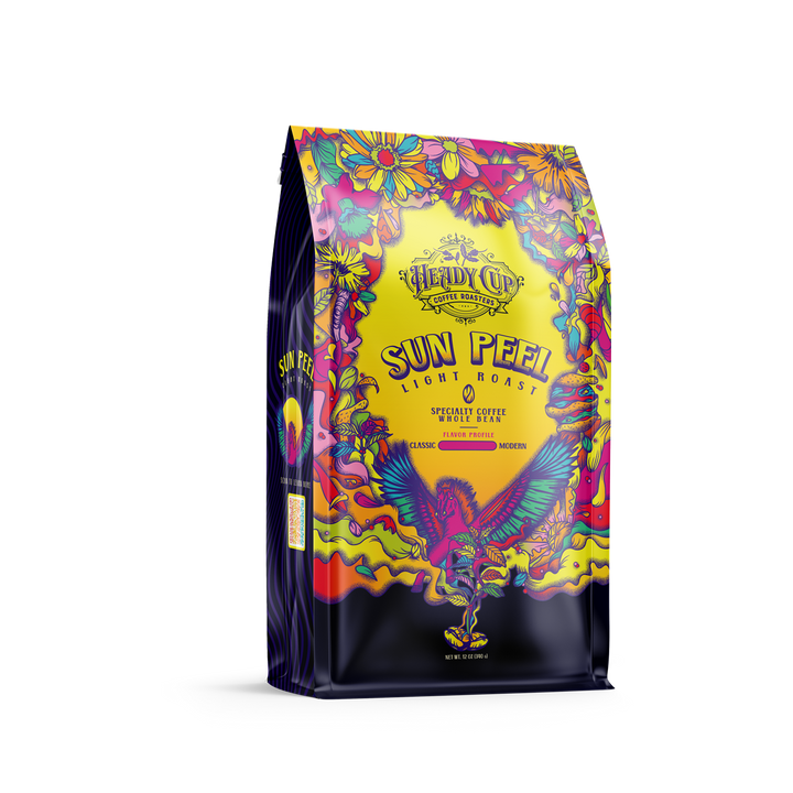 A colorful bag of Heady Cup Coffee Roasters light roast coffee named Sun Peel.