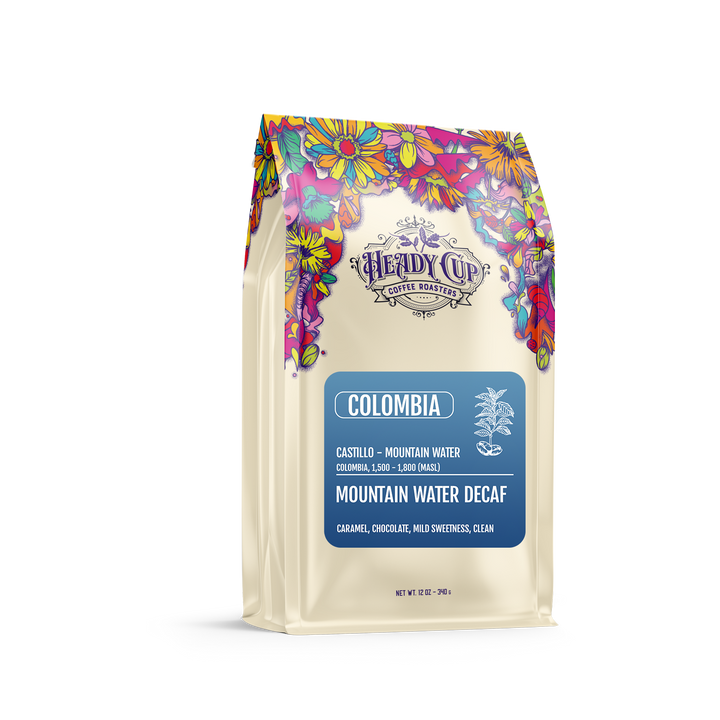 Heady Cup Colombia mountain water process decaf coffee package with colorful floral design on a white background