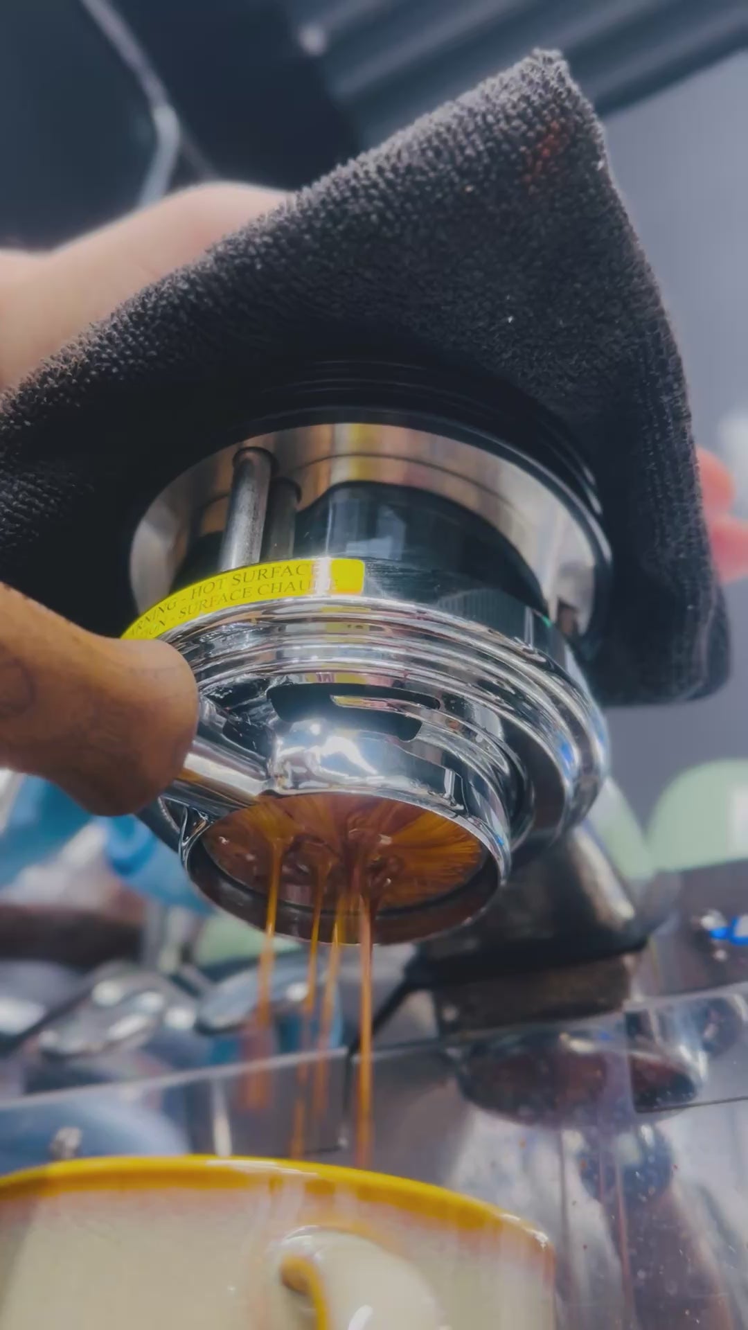 A Heady Cup Coffee Roasters Signature Espresso shot being pulled from a La Marzocco GS3