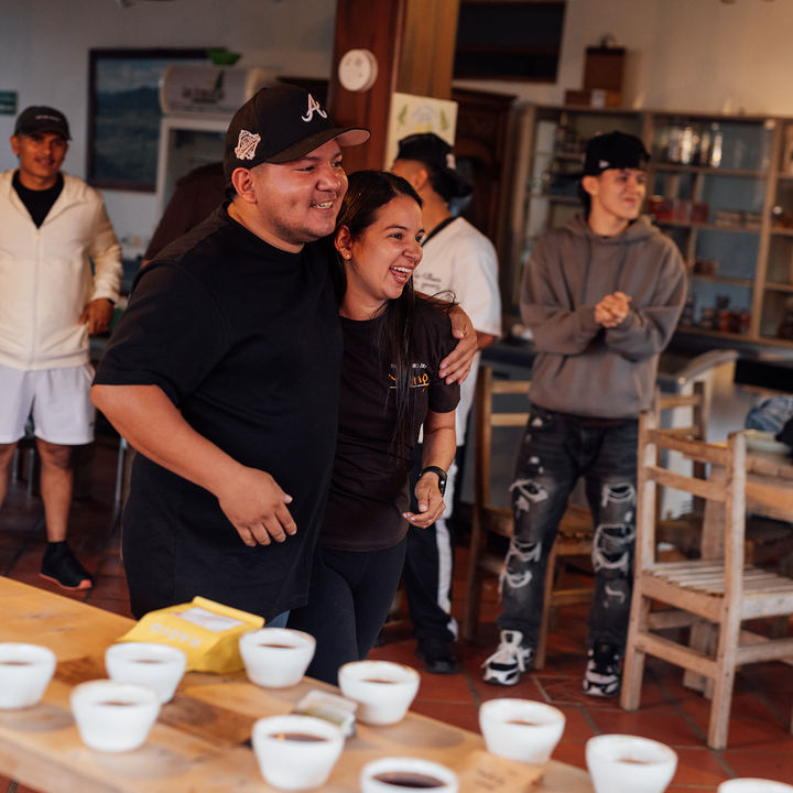Diego and Yessica Parra being honored for harvesting a beautiful lot of coffee that cupped off the charts!