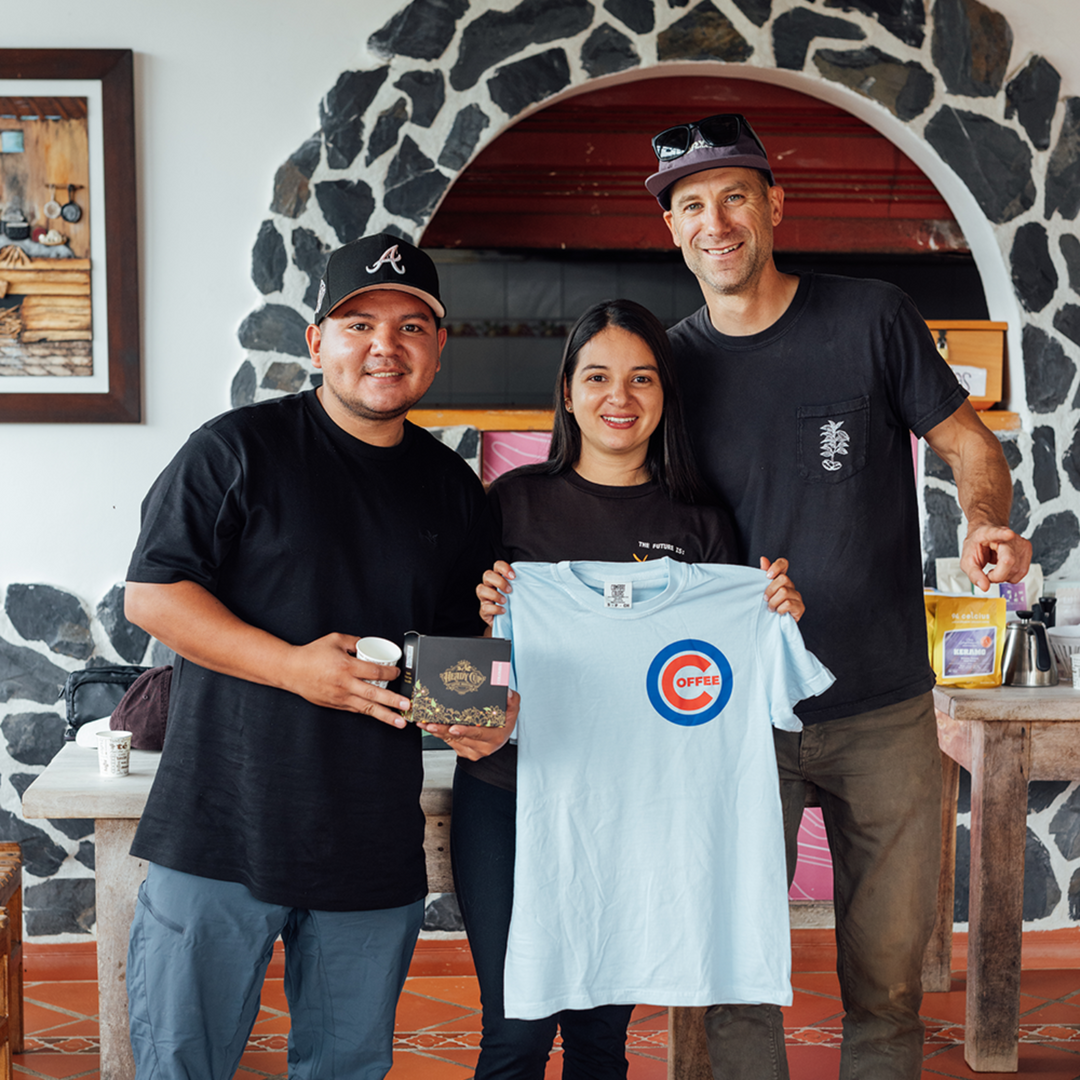 Michael Kivland, Yessica, and Diego Parra sharing a moment of gratitude amongst friends. 